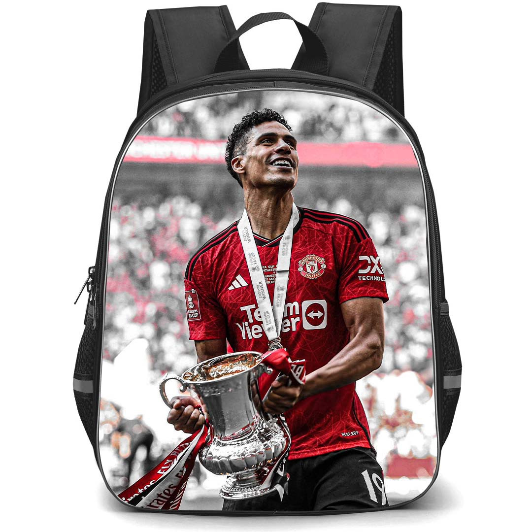 Manchester United F.C. Raphael Varane School Backpack StudentPack - Man United Raphael Varane Holding Trophy Picture