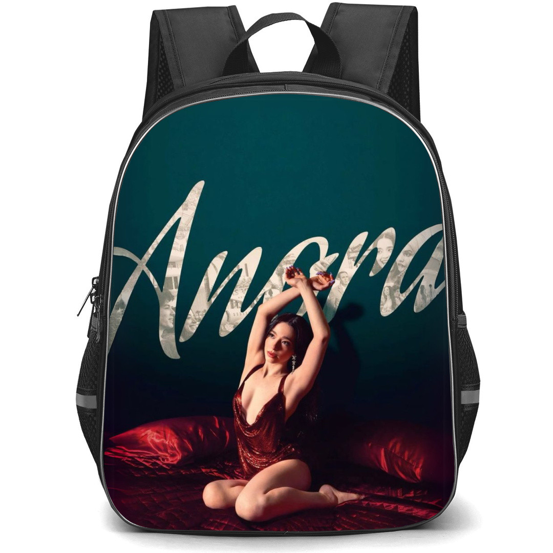 Anora Ani Backpack StudentPack - Ani Sitting On Red Bed On Green Background