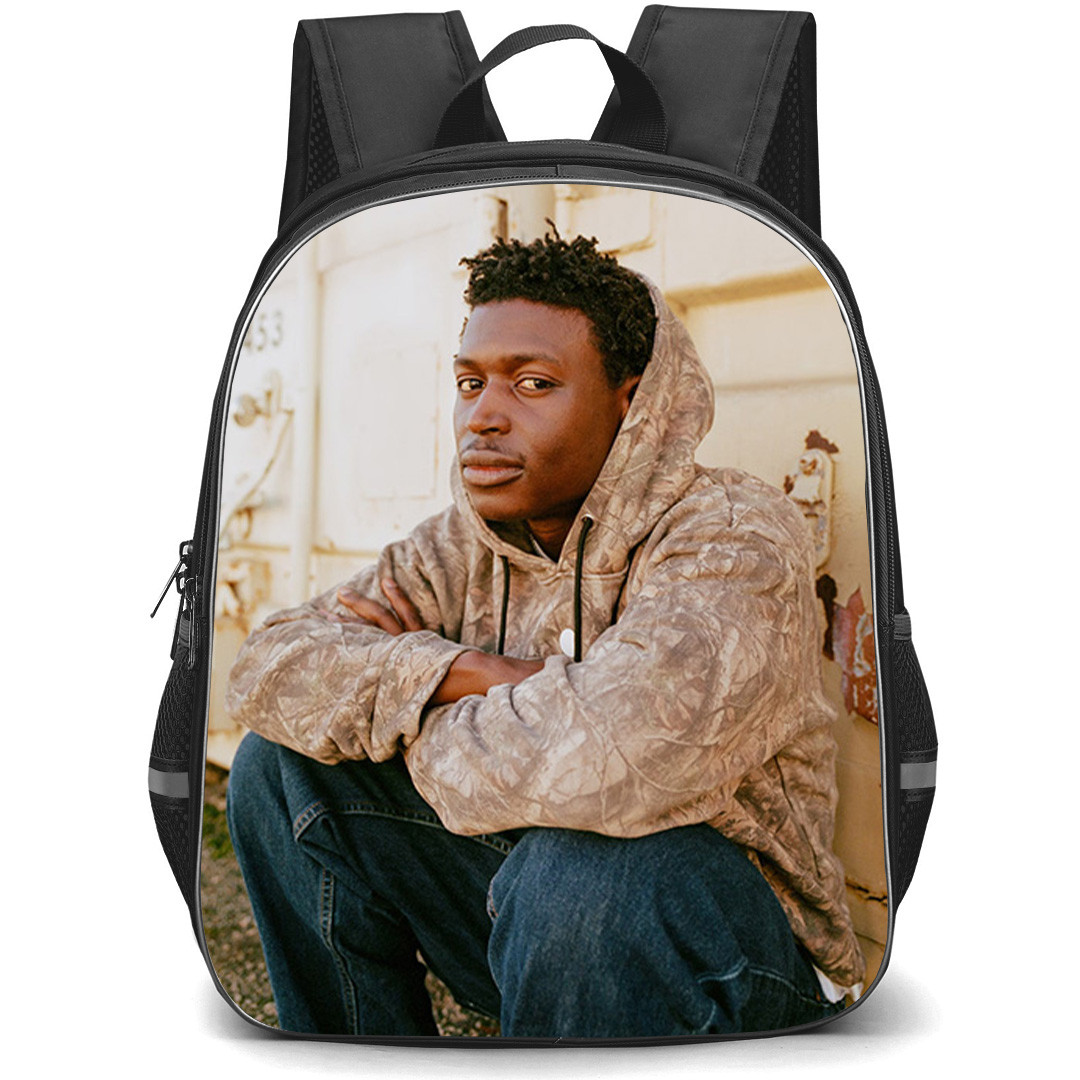 Mon Rovia Backpack School Bag StudentPack - Mon Rovia Sitting In Front Of A Container Poster