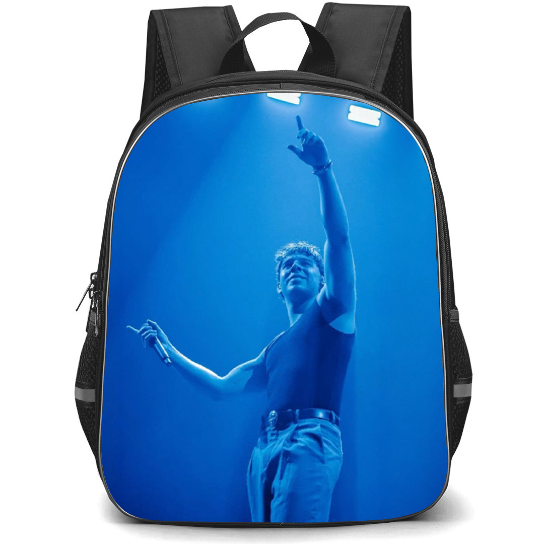 Quevedo Backpack School Bag StudentPack - Quevedo Pointing Pose Blue Background