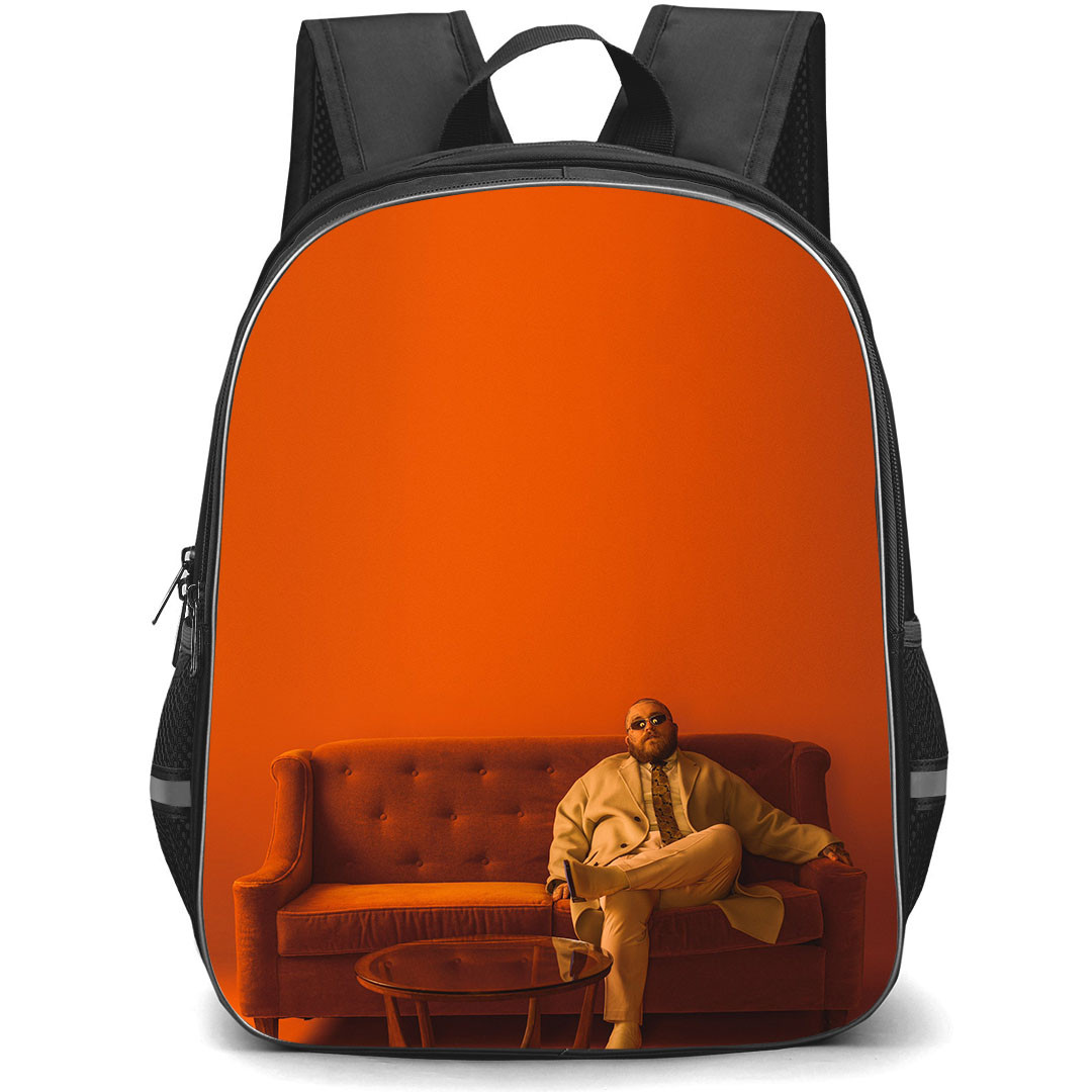 Teddy Swims Backpack StudentPack - Teddy Swims Sitting On A Sofa Orange Background