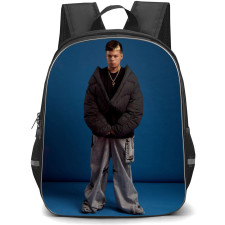 Saiko Backpack School Bag StudentPack - Saiko Wearing Black Puffer Jacket Blue Background